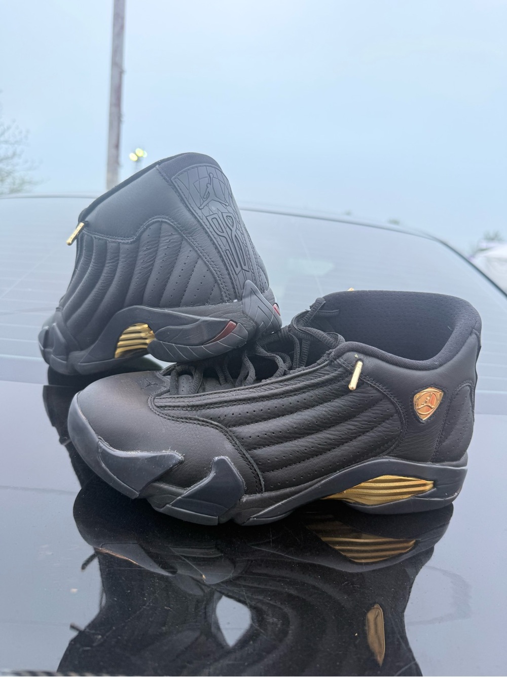Men's Black Jordan’s Athletic Sneakers with Gold Accents